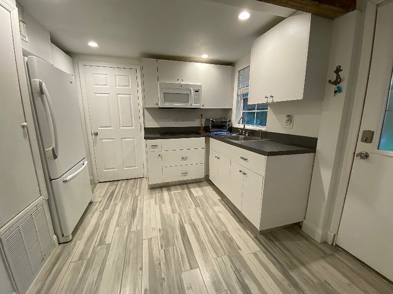 Kitchen. No over but has an above the counter baking/toaster oven large enough to bake pizzas, brownies etc.