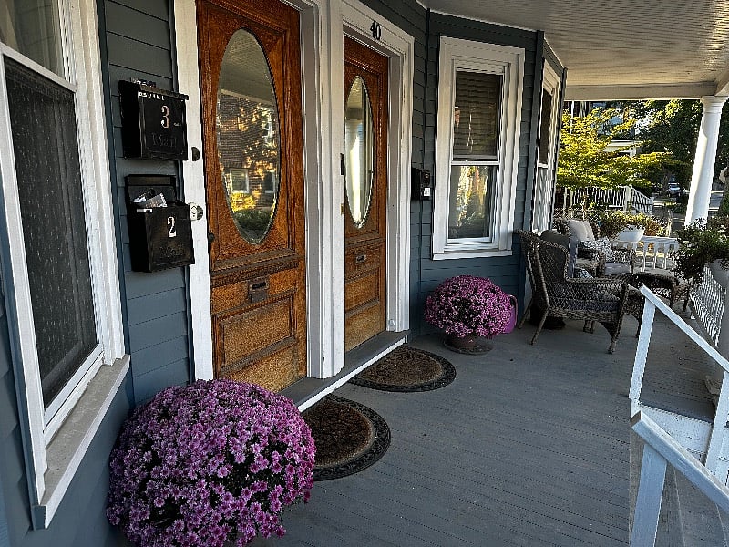 front door on right and exclusive use of front porch