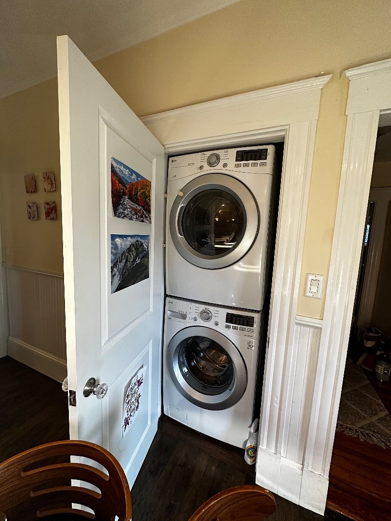 in unit laundry located in kitchen area. Laundry detergent included as a convenience.