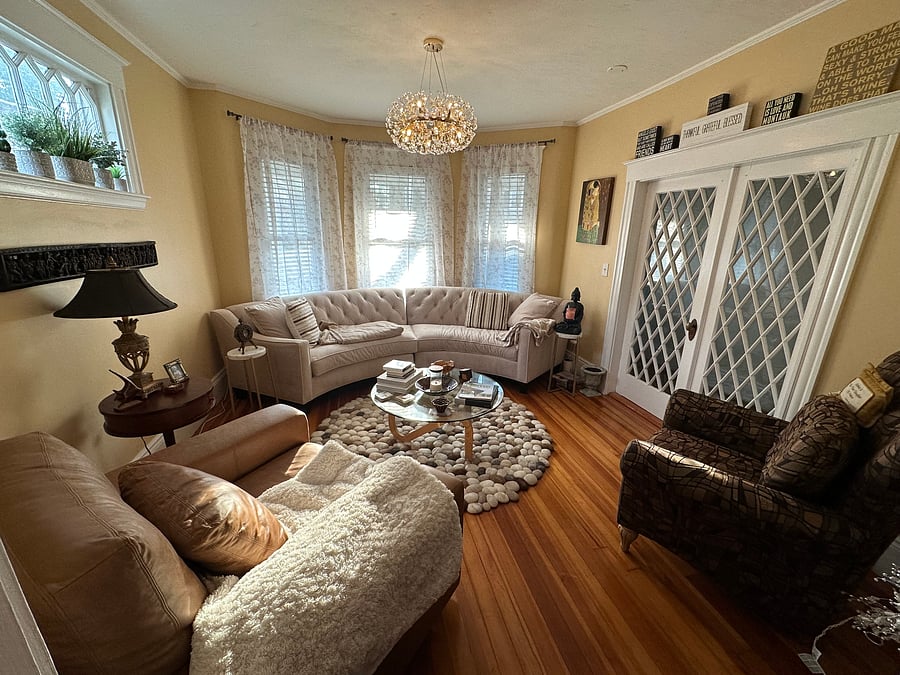 living room with comfy chairs to read in