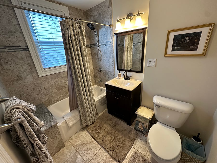 private ensuite bathroom with tub