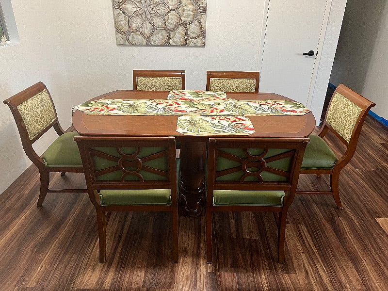New dining room table with six comfortable chairs.