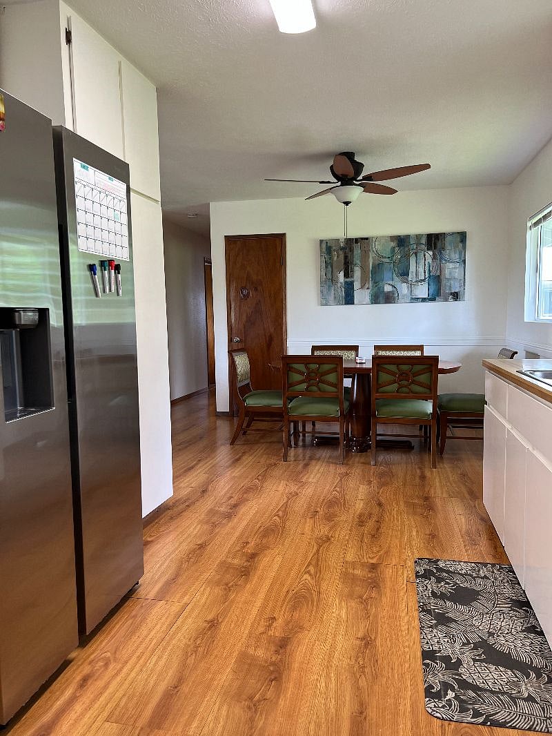 New s/s refrigerator with filtered ice and water dispensers in the door.