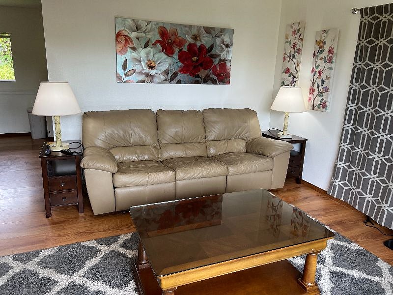 Newly added leather couch with recliners on each end.