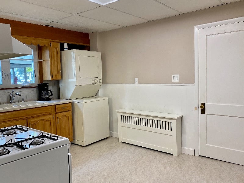 Kitchen with laundry. door to back hall/pantry