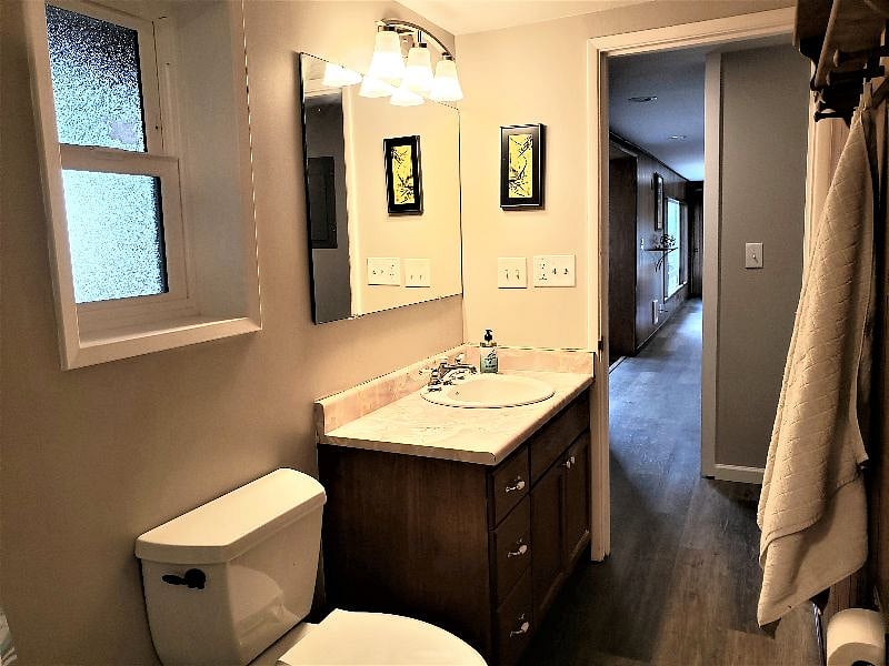 Bath towards kitchen
Large built-in storage cabinet in the opposite wall. 