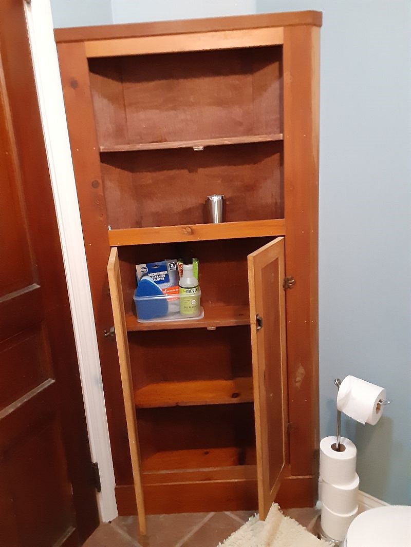 Private Bath storage cabinet.