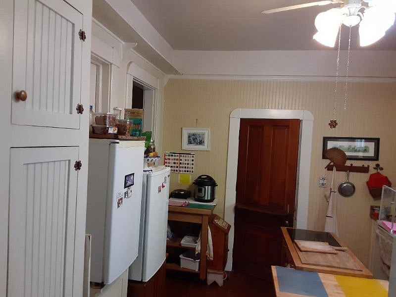Shared Kitchen.  The 2 mini fridges are for 2 Travel Nurses.  Both cabinets below are for their pantry needs.