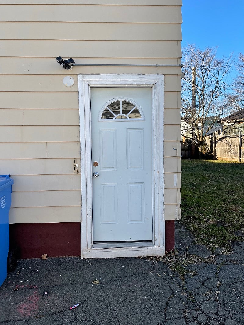 Side/back door entrance off of the driveway/parking area.