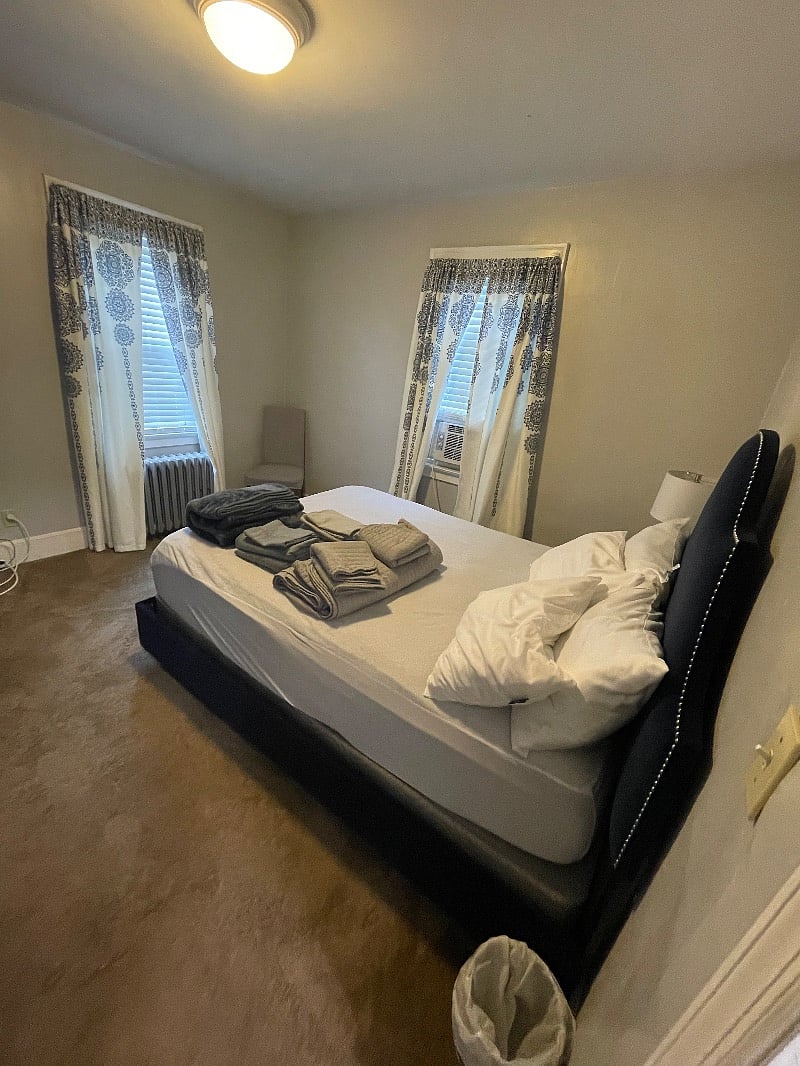 Master bedroom with queen sized bed. 