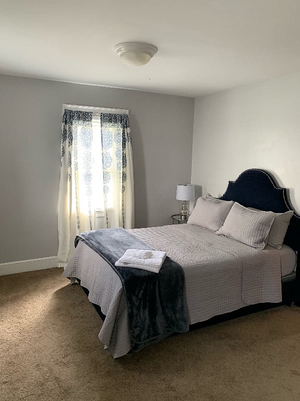 Main bedroom with large closet, queen size bed and 40 in. tv