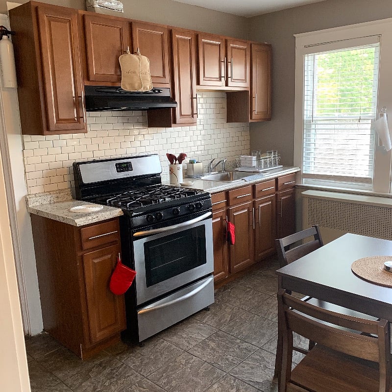 Kitchen with gas stove.