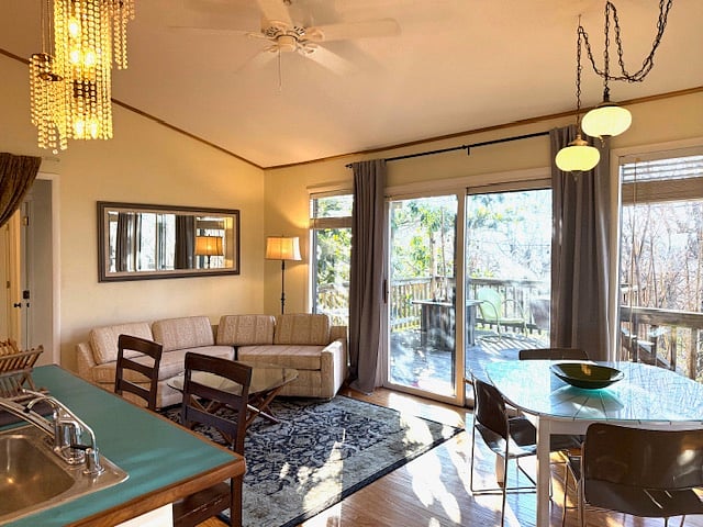open Living room kitchen concept. Deck off living space facing south