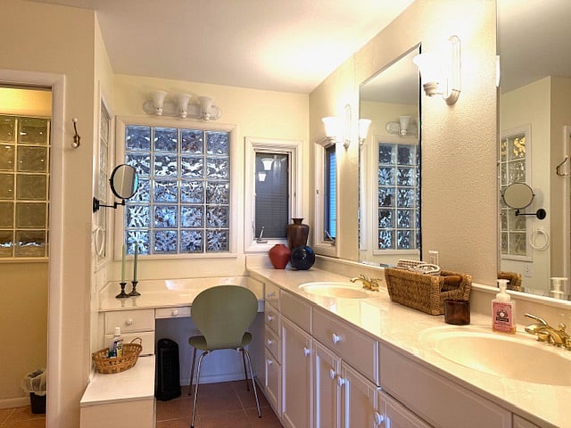 full bath, soak tub with rain shower, 2 sinks lots of mirrors