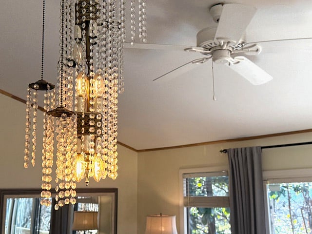 gorgeous Chandliers hanging above kitchen sink 