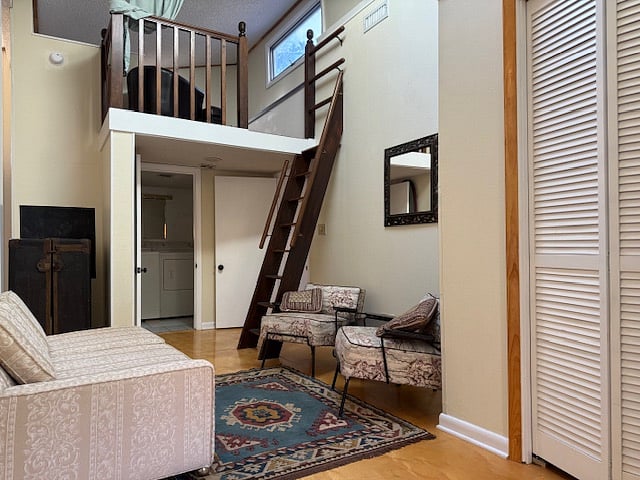 closet and doorway leading to 1/2 bath off bedroom and W/Dgas