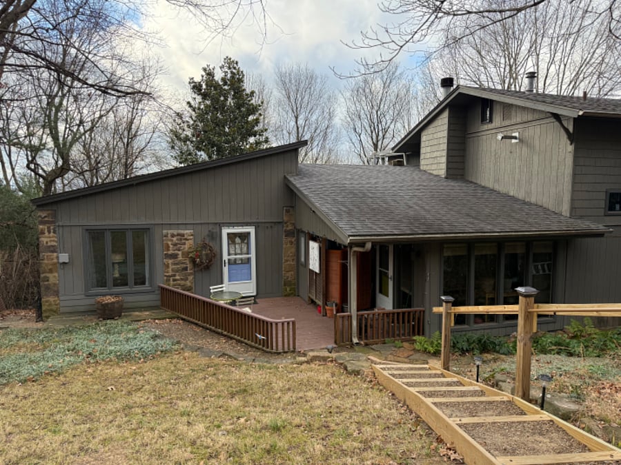 private entrance, there are 2, this entrance is just off where there is parking in front of the house, some stairs but easily to get down and up with a railing, yard and deck to enjoy!