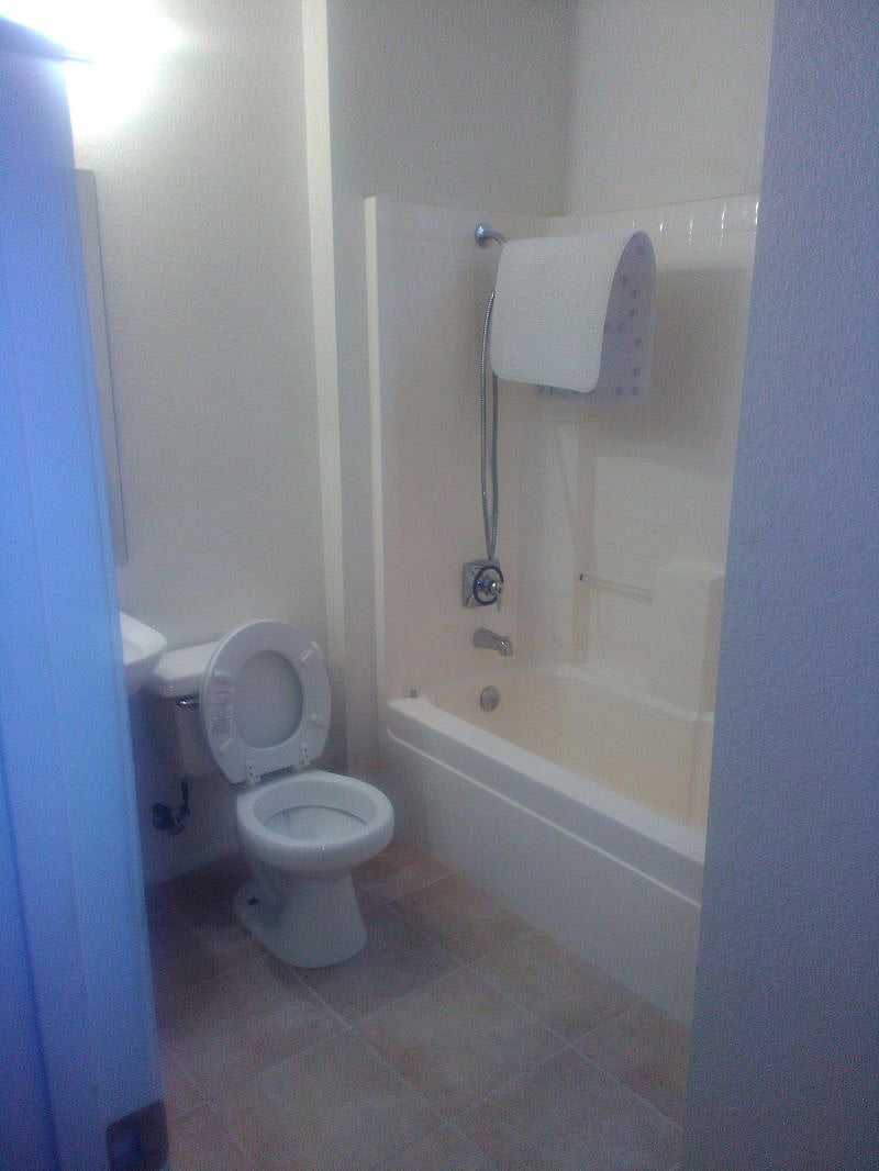 1st Bathroom with shower and bathtub