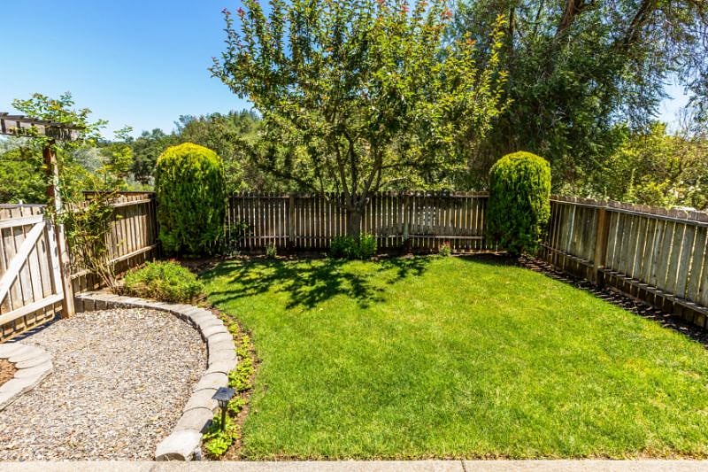 Private fenced yard.