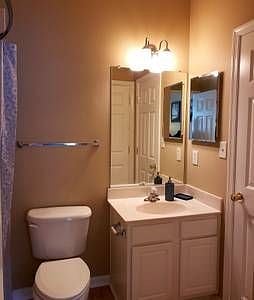 Did I mention this bathroom's the biggest in the house, you've got storage under the vanity, in the medicine cabinet, and an entire linen closet!
