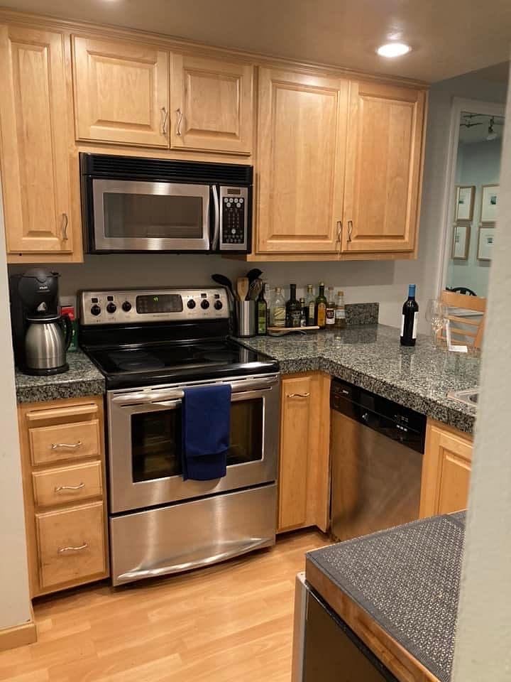 Kitchen Includes: Stove, Microwave and Newer Dishwasher. 