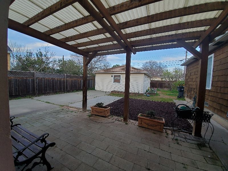 PRIVATE ENTRANCE & DESIGNATED PARKING SPACE. SHARED BACK YARD