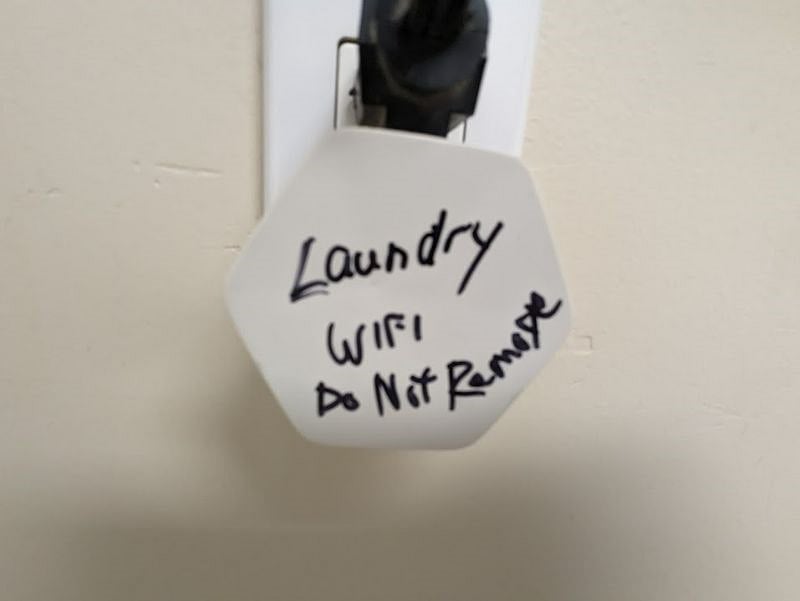 DO NOT REMOVE OR UNPLUG WIFI EXTENDER