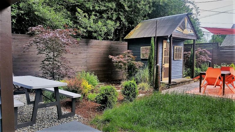 View of garden from private patio. Picnic table for your use