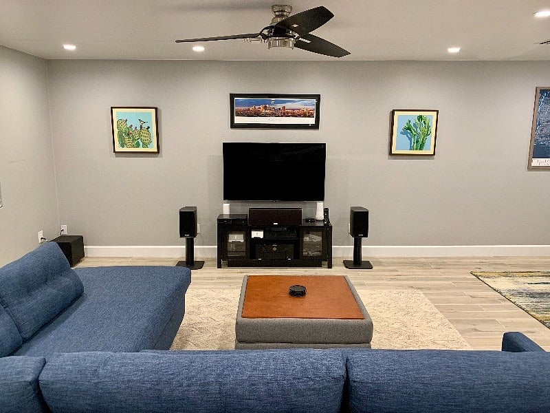 Entertainment center with 5.1 surround sound system including in-ceiling rear surround speakers.