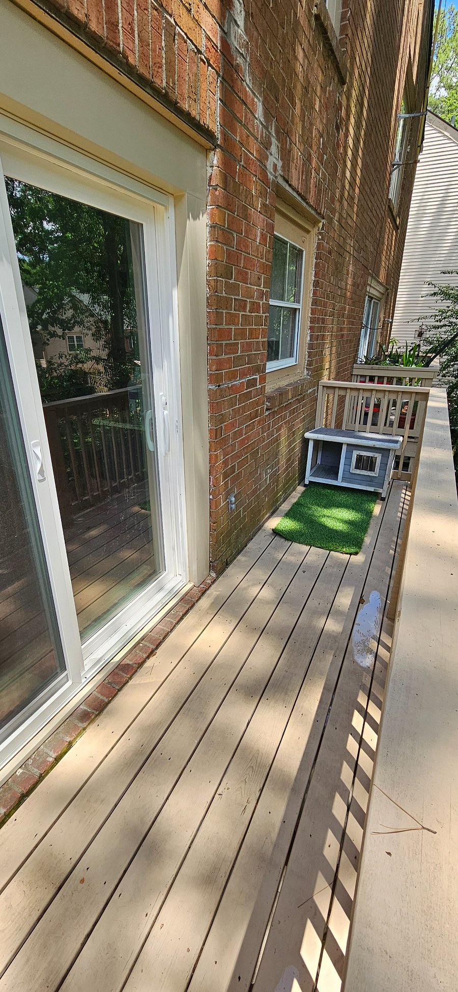 Balcony with a small pet condo