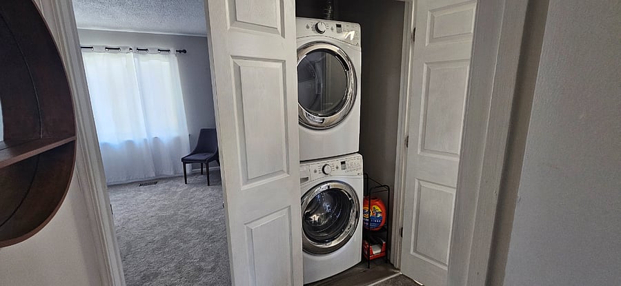 Full-size washer and dryer private just off the bedrooms upstairs.