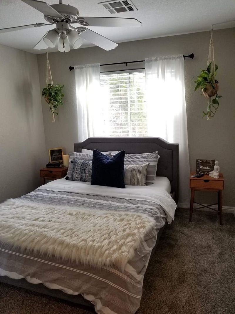 This Bedroom has a 32 Smart TV, ceiling fan, memory foam mattress, double door mirrored closet, and really peaceful view of the trees outside.