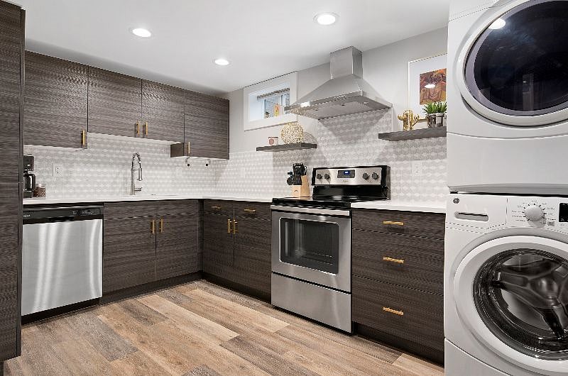 The kitchen has a full sized stove / oven, fridge and dishwasher for your convenience.