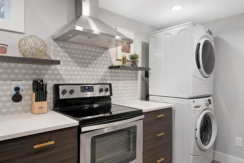 You have a full sized washer & dryer right in your unit.