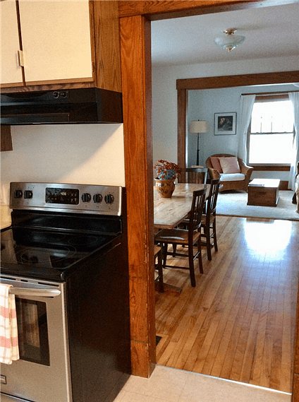 The kitchen leads in to the dining room that seats six comfortably