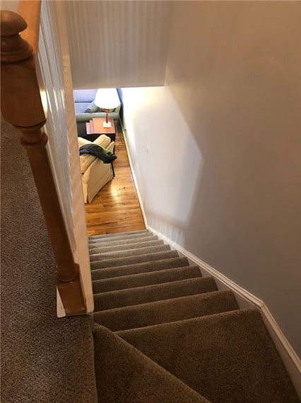 View walking downstairs