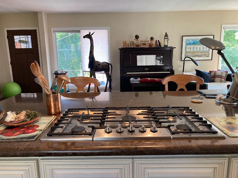 Great room with huge island for cooking while entertaining or watching TV