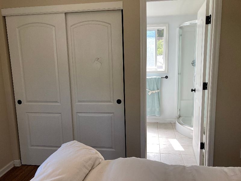 Double closet and private bath with shower