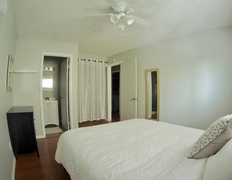 Master bedroom with ensuite half bath