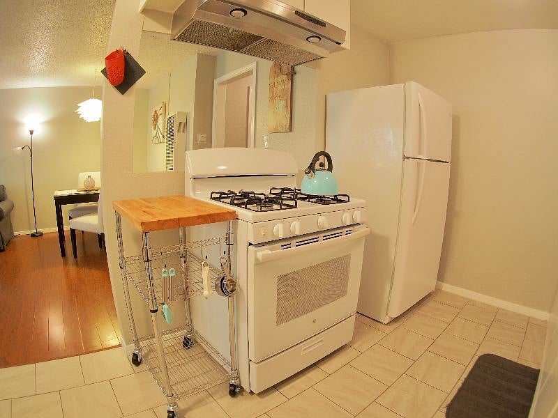 Extra storage and a rolling butcher block for cooking convenience.