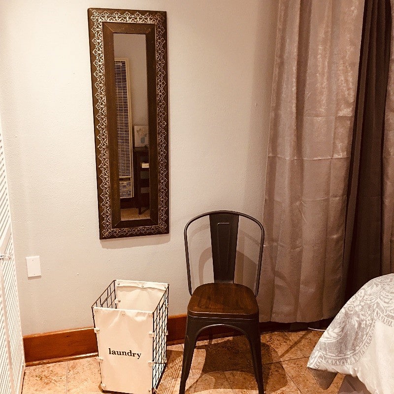 Sitting area in bedroom w mirror