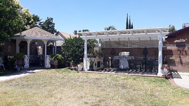 Backyard w/ gazebo and BBQ pit 