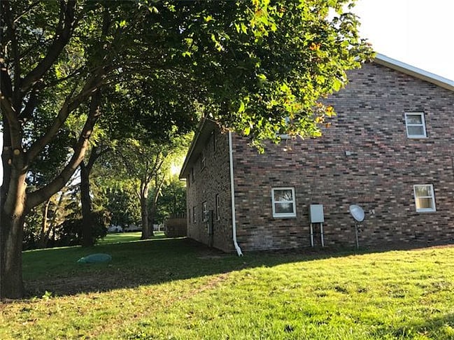 Large backyard suitable for pets and regularly maintained.