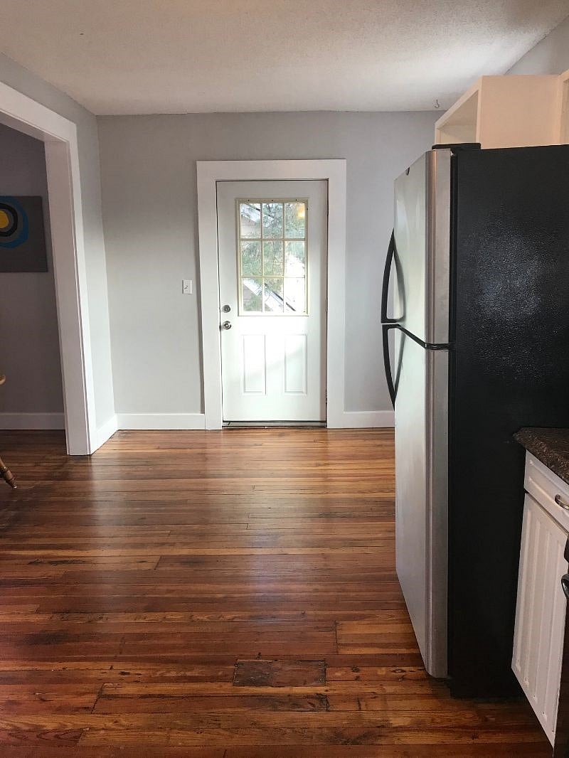 Kitchen with back door leading to backyard
