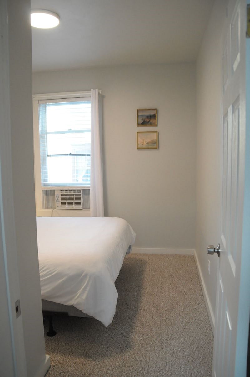 1st Bedroom with a queen bed