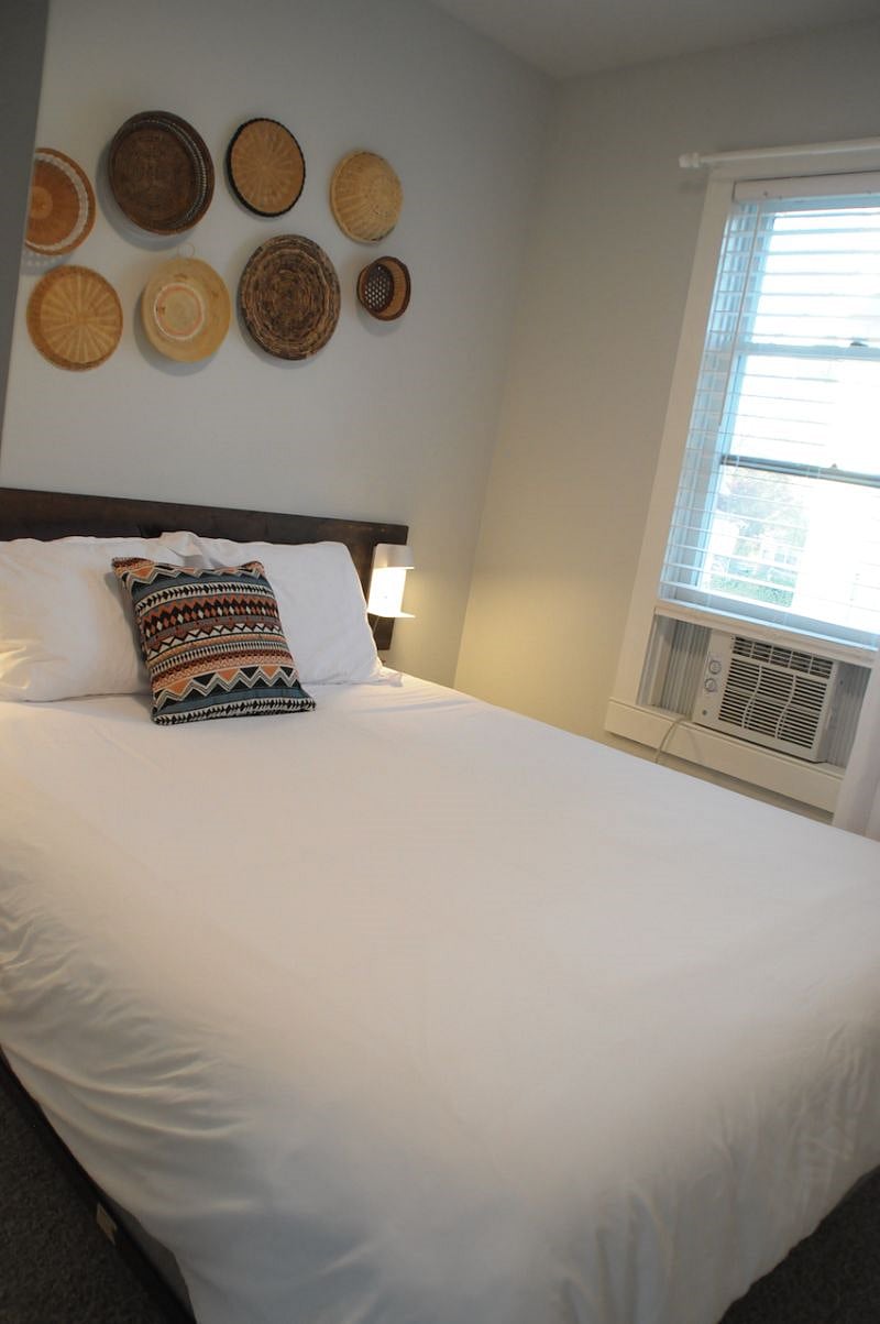 Bedroom comes with air conditioning window unit