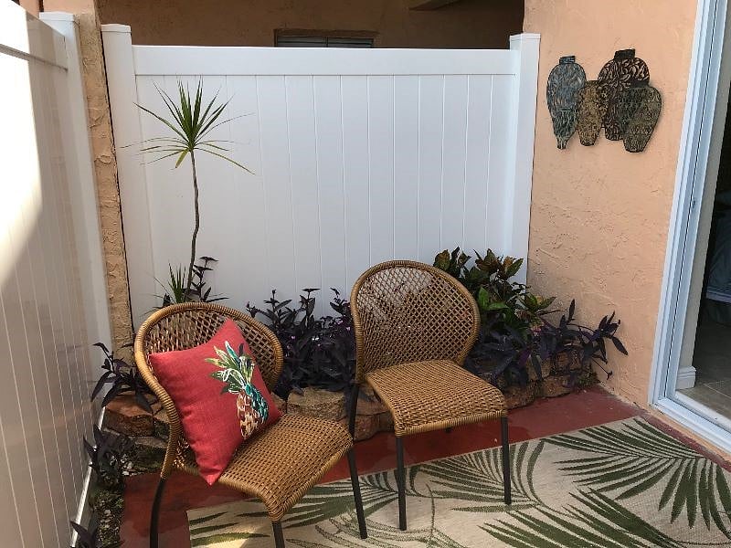 Private patio with locking gate for security.