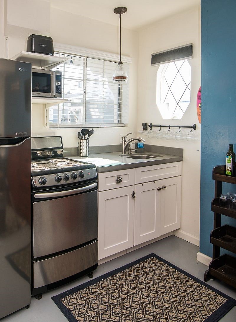 Full size refrigerator, stove/oven and microwave, toaster