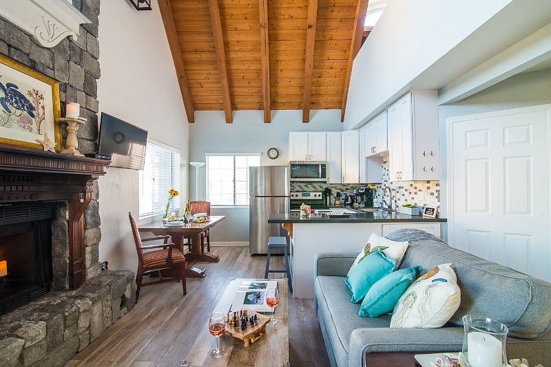 Living room with couch,  coffee table and smart TV