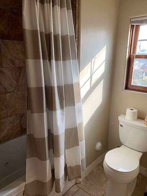 Shower and toilet area in the bathroom